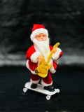 Musical Santa Playing Guitar on Skate Board Toy