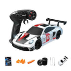 White Porsche 911 RC drift car with 2.4GHz remote controller and accessories Cocoland Toys
