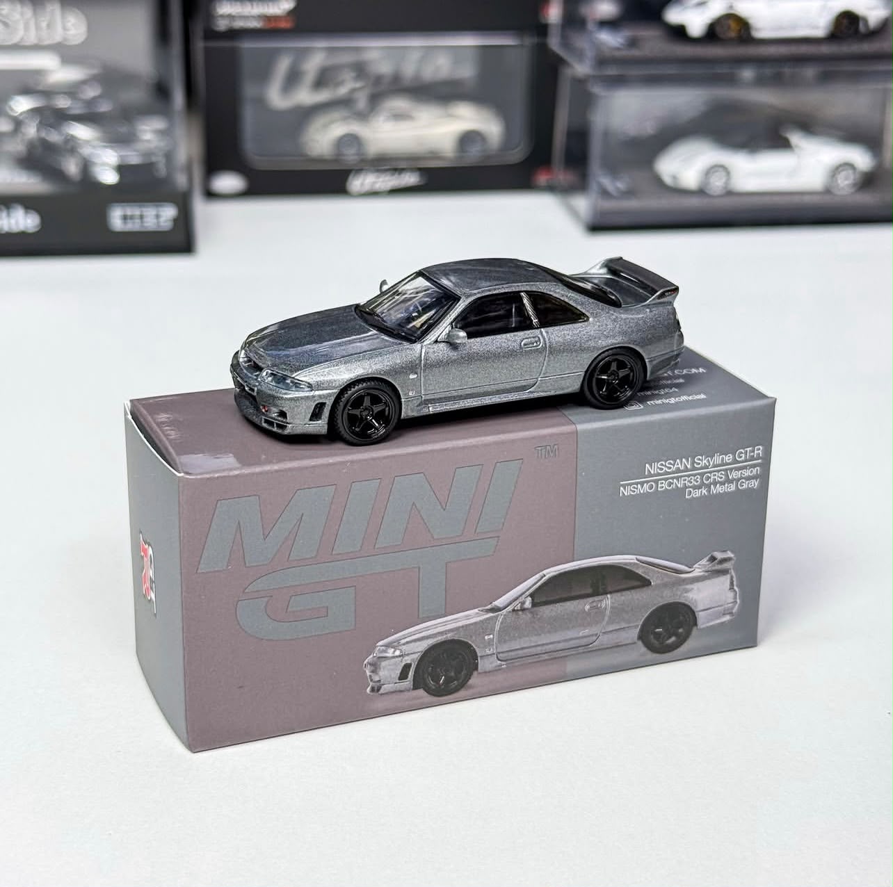MINI GT Nissan Skyline GT-R Dark Metal Gray (NISMO BNR34 CRS Version) 1:64 Scale Die Cast Car