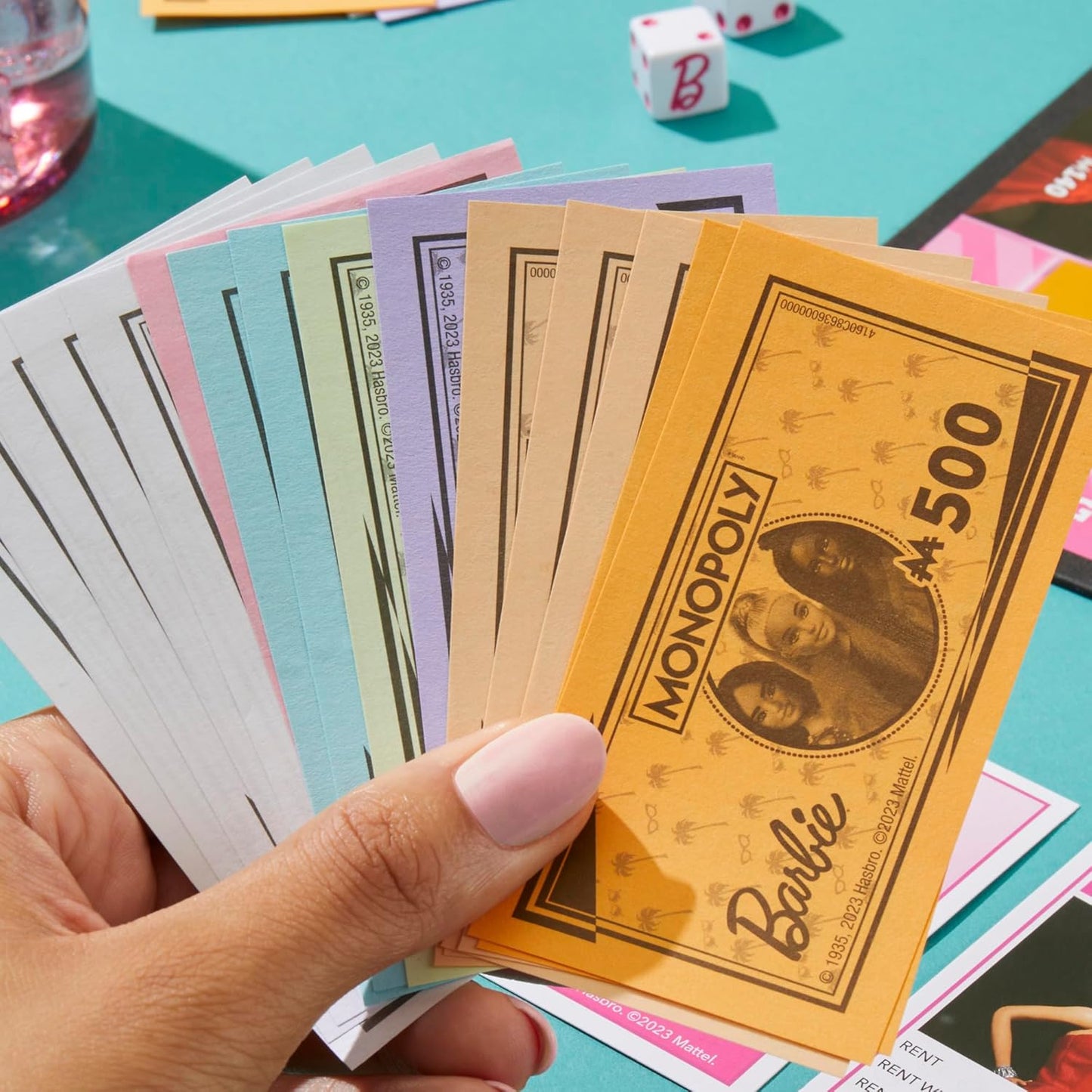 Monopoly: Barbie Edition Board Game, Ages 8+, 2-6 Players, Fun Family Games for Kids and Adults, with 6 Barbie-Themed Pink Zinc Tokens, Kids Gifts