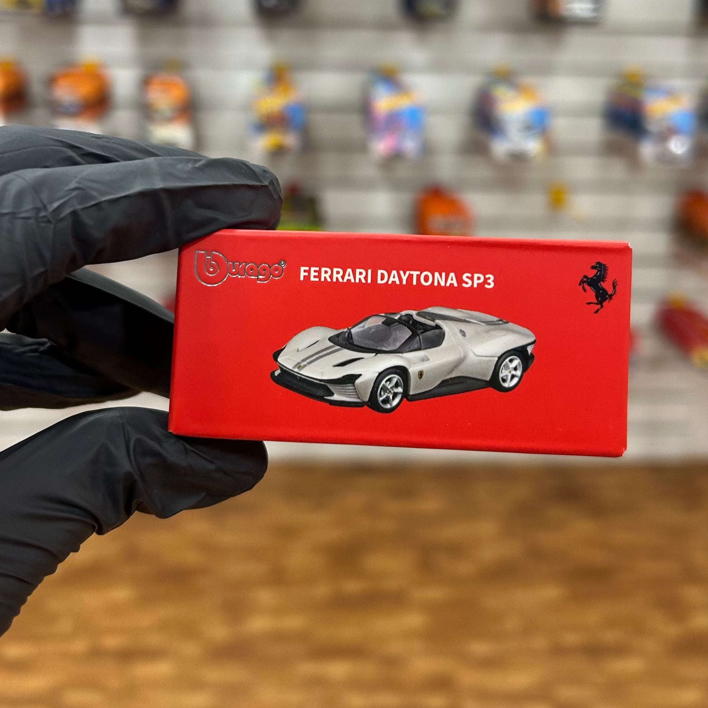 White Ferrari Daytona SP3 collectible car with packaging Cocoland Toys