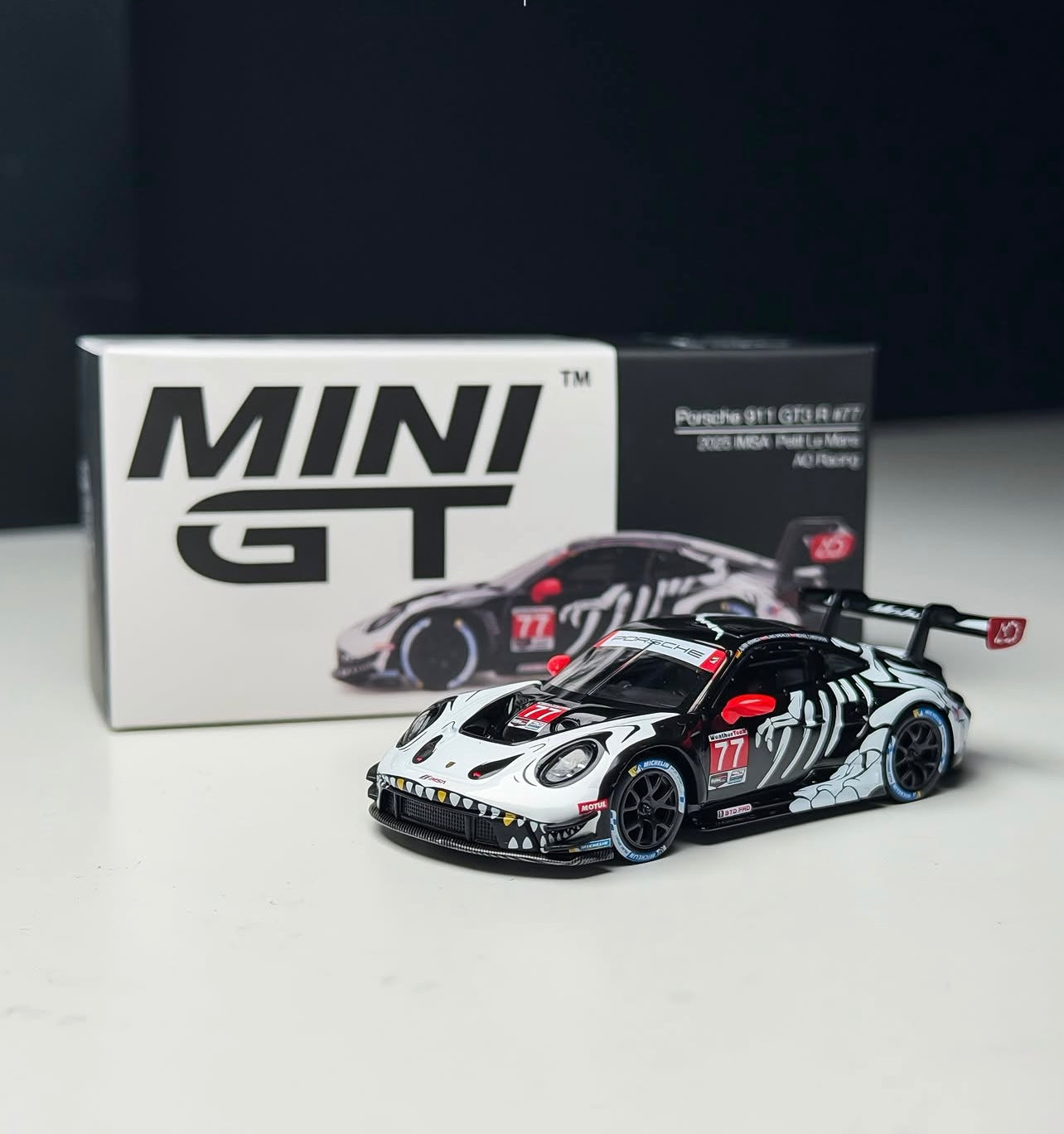 MINI GT Porsche 911 GT3 R #77 AO Racing 2025 IMSA Petit Le Mans Cocoland Toys