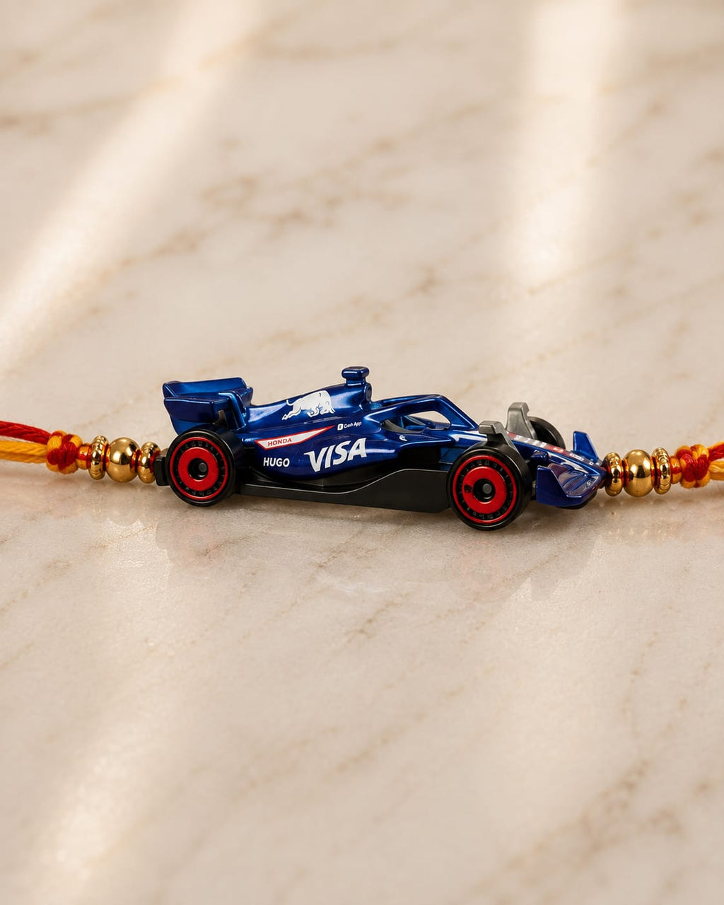 Hot Wheels Style Alpine F1 Racing Car Rakhi (Random 1)