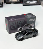 MINI GT Nissan Skyline GT-R Dark Metal Gray (NISMO BNR34 CRS Version) 1:64 Scale Die Cast Car