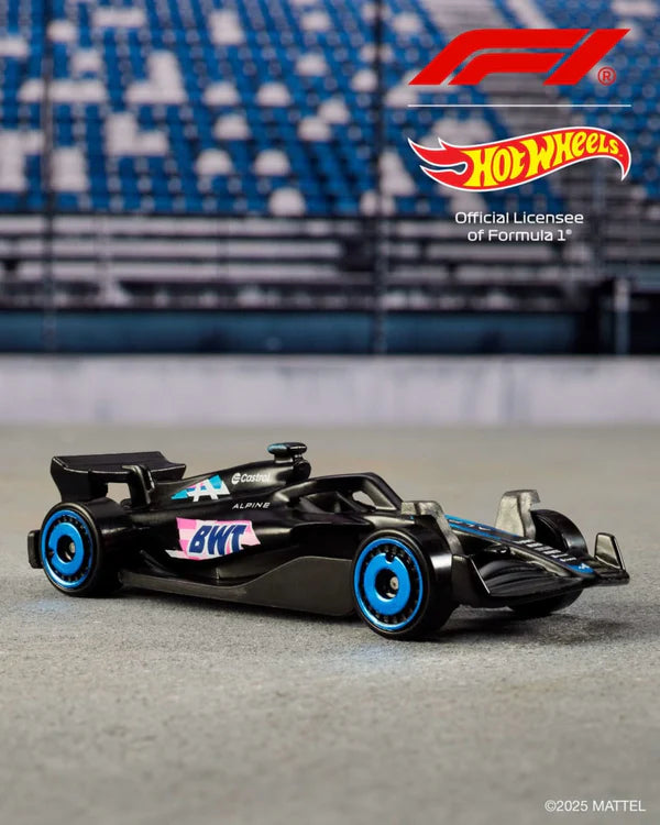 Cocoland Toyz Hot Wheels Formula 1 race car with blue accents side view