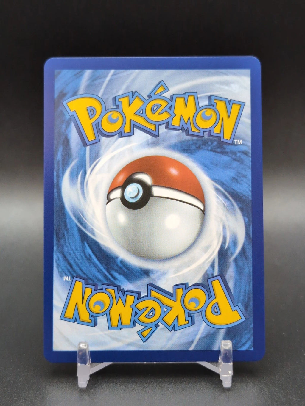Cocoland Pokémon trading card with a Poké Ball design on a dark background