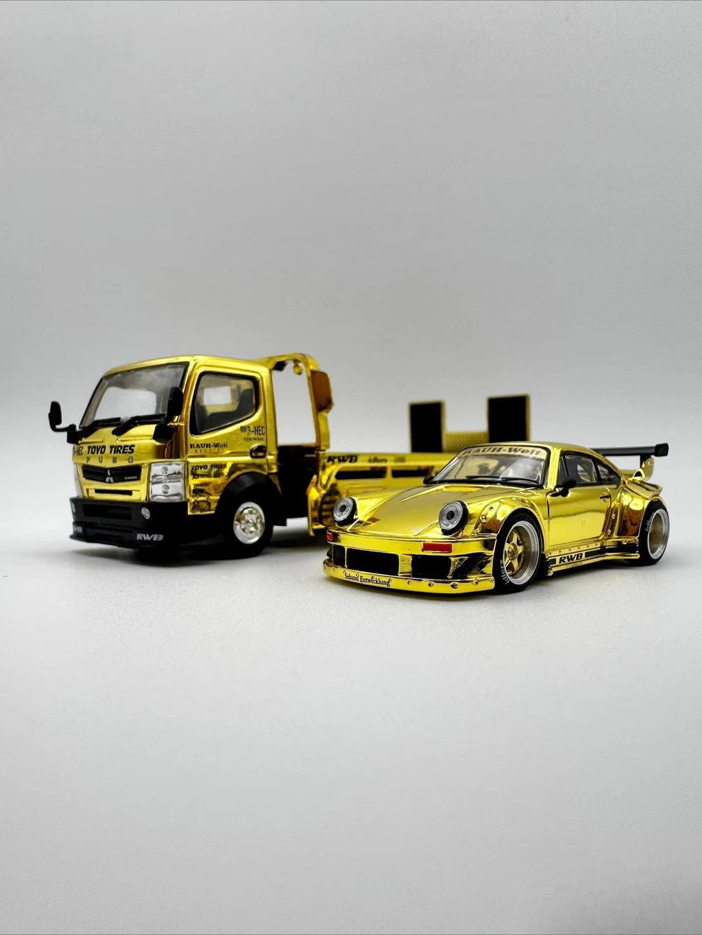 [PRE-ORDER] Pop Race XCartoys HEC Beijing 1/64 RWB 930 Gold Set Ltd 300 Truck Transporter Limited-Edition Gold Chrome Finish